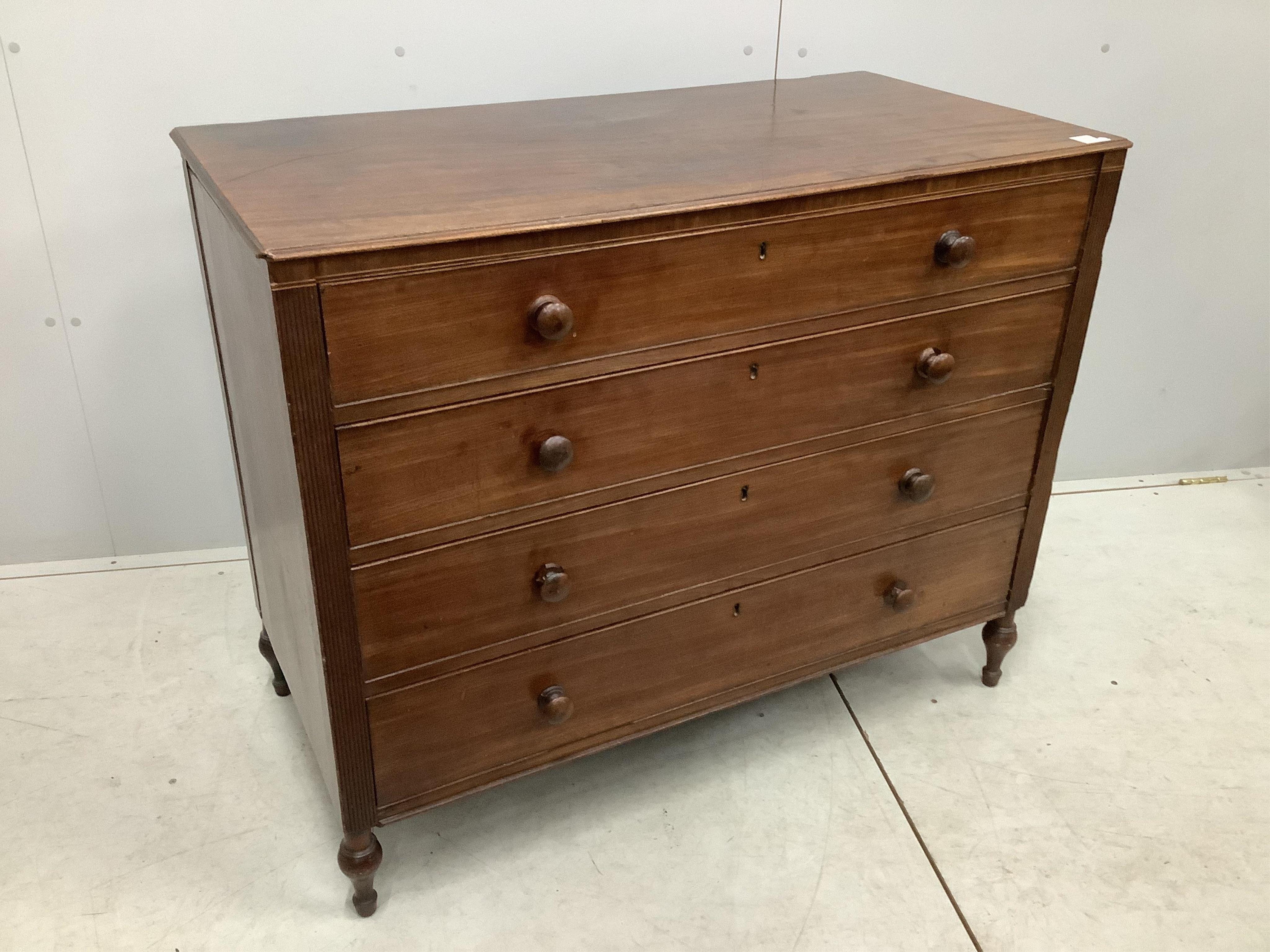 A Regency mahogany straight front chest of four drawers, with reeded pilasters, width 108cm, depth 55cm, height 87cm. Condition - poor to fair, some minor losses